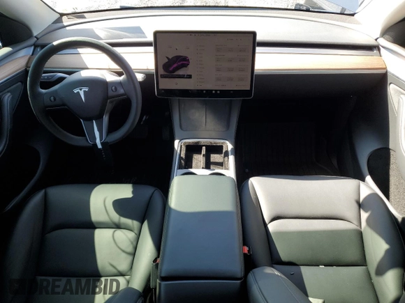 2025 Tesla Model Y Long Range with VIN 7SAYGDED0SF247561, listed as a Copart auction lot 50736875 with 9,094 mi miles and Salvage Title. Bid and sale history available at DreamBid. Image 8.