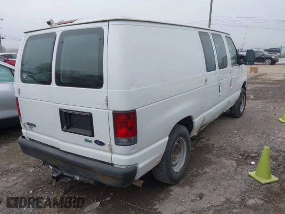 2009 Ford Econoline Cargo Commercial with VIN 1FTNE14W09DA93314, listed as a IAAI auction lot 41502673 with 251,052 mi miles and . Bid and sale history available at DreamBid. Image 4.