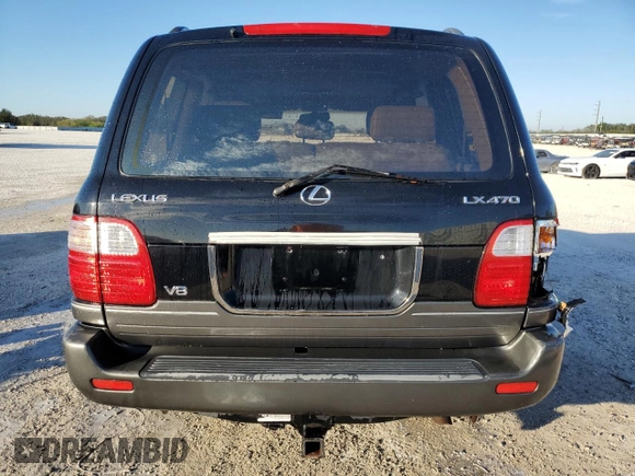 2000 Lexus LX 470 z VIN JT6HT00W3Y0090164, wystawiony jako Copart lot #41338515 z przebiegiem 209 338 mil mil oraz Szkoda całkowita • Salvage title. Historia ofert i sprzedaży dostępna na DreamBid. Obrazek 6.