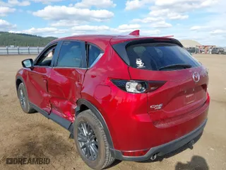 2019 Mazda CX-5 Touring with VIN JM3KFBCMXK1658009, listed as a IAAI auction lot 42028300 with 33,419 mi miles. Bid and sale history available at carsss.com. Image 3.