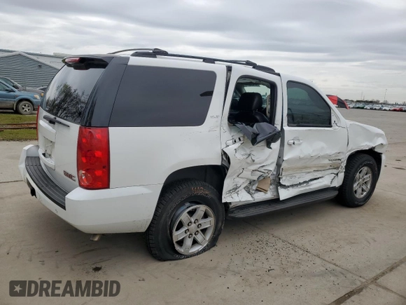 2014 GMC Yukon SLT with VIN 1GKS1CE05ER249398, listed as a Copart auction lot 47493915 with 139,824 mi miles and Salvage Title. Bid and sale history available at carsss.com. Image 3.