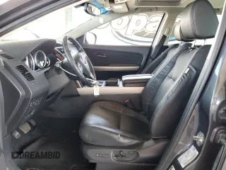 2015 Mazda CX-9 Grand Touring z VIN JM3TB3DV2F0456130, wystawiony jako Copart lot #55787935 z przebiegiem 120 888 mil mil oraz Szkoda całkowita • Salvage title. Historia ofert i sprzedaży dostępna na DreamBid. Obrazek 7.