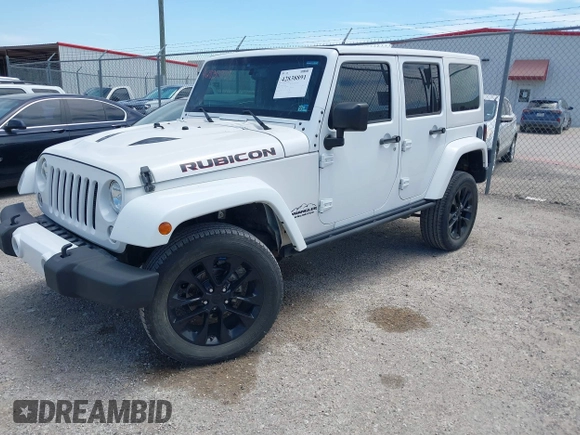 2015 Jeep Wrangler Unlimited Rubicon z VIN 1C4BJWFG1FL544883, wystawiony jako IAAI lot #42838891 z przebiegiem 87 801 mil mil oraz . Historia ofert i sprzedaży dostępna na DreamBid. Obrazek 17.
