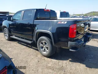 2018 Chevrolet Colorado 4WD Z71 z VIN 1GCGTDEN0J1173420, wystawiony jako IAAI lot #41971813 z przebiegiem 98 499 mil mil oraz . Historia ofert i sprzedaży dostępna na DreamBid. Obrazek 3.
