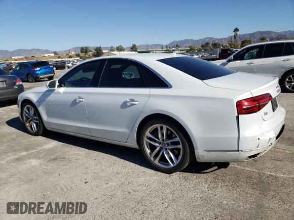 2015 Audi A8 с VIN WAUJGAFD3FN030568, выставлен на аукционе Copart как лот 75785923 с пробегом 83 911 миль миль и . История ставок и продаж доступна на DreamBid. Изображение 2.