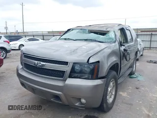 2007 Chevrolet Tahoe LT z VIN 1GNFC13J77R113842, wystawiony jako IAAI lot #42293559 z przebiegiem 288 926 mil mil oraz . Historia ofert i sprzedaży dostępna na DreamBid. Obrazek 2.
