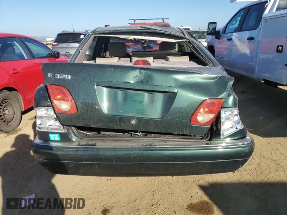 1996 Mercedes-Benz E-Class with VIN WDBJF55FXTJ011680, listed as a Copart auction lot 88752555 with 0 mi miles and Salvage Title. Bid and sale history available at carsss.com. Image 6.
