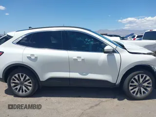 2022 Ford Escape Titanium z VIN 1FMCU9J97NUB89504, wystawiony jako IAAI lot #42571833 z przebiegiem Nie podano mil oraz . Historia ofert i sprzedaży dostępna na DreamBid. Obrazek 13.