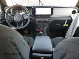 2024 Jeep Wrangler Willys с VIN 1C4RJXN66RW275795, выставлен на аукционе Copart как лот 48113615 с пробегом 8 997 миль миль и Списание • Salvage title. История ставок и продаж доступна на DreamBid. Изображение 8.