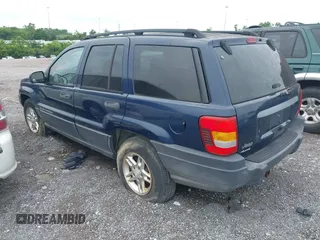 2003 Jeep Grand Cherokee Laredo with VIN 1J4GW48S63C591605, listed as a IAAI auction lot 42389898 with 177,024 mi miles and . Bid and sale history available at DreamBid. Image 3.