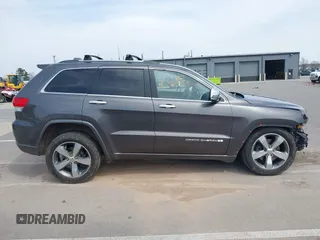 2014 Jeep Grand Cherokee Overland with VIN 1C4RJFCT6EC187098, listed as a IAAI auction lot 42077453 with 172,220 mi miles and . Bid and sale history available at DreamBid. Image 14.