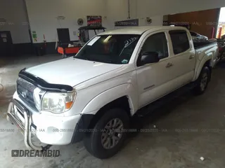 2009 Toyota Tacoma PreRunner with VIN 3TMJU62N59M083231, listed as a IAAI auction lot 28518886 with 190,324 mi miles. Bid and sale history available at carsss.com. Image 2.