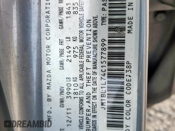 2012 Mazda 3 i Touring with VIN JM1BL1L74C1577899, listed as a Copart auction lot 59716435 with 132,718 mi miles and Salvage title. Bid and sale history available at DreamBid. Image 12.
