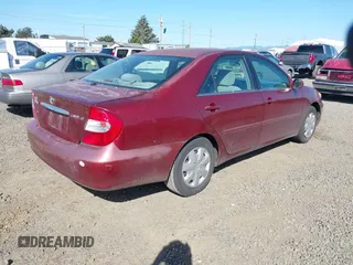 2003 Toyota Camry LE with VIN 4T1BE32K33U147710, listed as a IAAI auction lot 42184705 with 305,390 mi miles and . Bid and sale history available at DreamBid. Image 4.