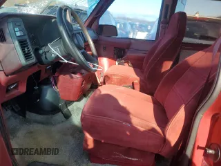 1992 GMC Safari z VIN 1GDEL19W2NB539396, wystawiony jako Copart lot #79221434 z przebiegiem 99 406 mil mil oraz Nie do naprawy. Historia ofert i sprzedaży dostępna na DreamBid. Obrazek 7.