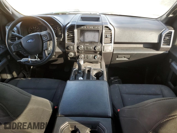 2018 Ford F-150 XL with VIN 1FTEW1E57JKE06779, listed as a Copart auction lot 84183014 with 198,203 mi miles and Salvage Title. Bid and sale history available at carsss.com. Image 8.