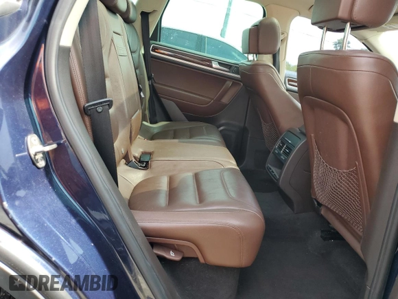 2013 Volkswagen Touareg Lux с VIN WVGEF9BP0DD002456, выставлен на аукционе Copart как лот 56034435 с пробегом 131 412 миль миль и Списание • Salvage title. История ставок и продаж доступна на DreamBid. Изображение 11.