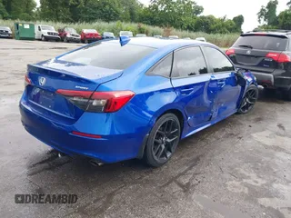 2022 Honda Civic Sport with VIN 2HGFE2F56NH535574, listed as a IAAI auction lot 40068308 with 82,662 mi miles. Bid and sale history available at carsss.com. Image 4.