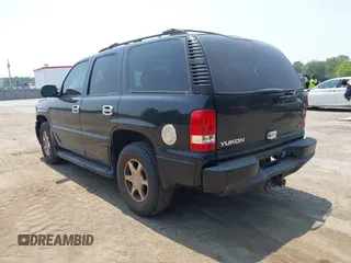 2002 GMC Yukon Denali z VIN 1GKEK63U82J189550, wystawiony jako IAAI lot #42416885 z przebiegiem 209 115 mil mil oraz . Historia ofert i sprzedaży dostępna na DreamBid. Obrazek 3.