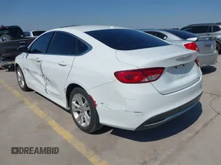 2015 Chrysler 200 Limited with VIN 1C3CCCAB1FN635363, listed as a IAAI auction lot 40522051 with 158,925 mi miles and . Bid and sale history available at DreamBid. Image 3.