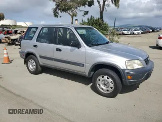 2001 Honda CR-V LX with VIN JHLRD28401S017050, listed as a Copart auction lot 51056085 with 250,336 mi miles and Salvage Title. Bid and sale history available at carsss.com. Image 4.