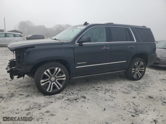 2018 GMC Yukon Denali with VIN 1GKS2CKJ2JR268981, listed as a Copart auction lot 49140145 with 81,586 mi miles and Salvage Title. Bid and sale history available at carsss.com. Image 1.
