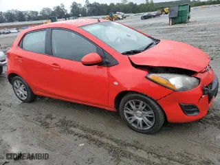 2012 Mazda Mazda2 Sport with VIN JM1DE1KY0C0142042, listed as a Copart auction lot 71741314 with 106,232 mi miles and Salvage Title. Bid and sale history available at carsss.com. Image 4.
