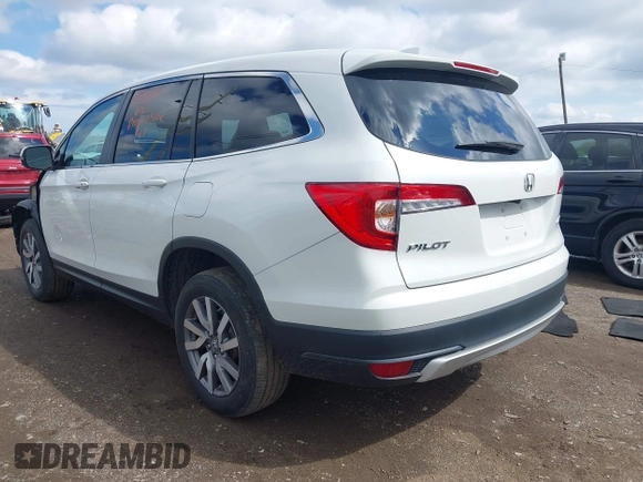 2021 Honda Pilot EX-L with VIN 5FNYF6H57MB054147, listed as a IAAI auction lot 42158910 with 37,811 mi miles and . Bid and sale history available at DreamBid. Image 3.