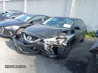 2016 Nissan Maxima SL with VIN 1N4AA6AP5GC448751, listed as a IAAI auction lot 41935029 with 105,101 mi miles and . Bid and sale history available at DreamBid. Image 20.