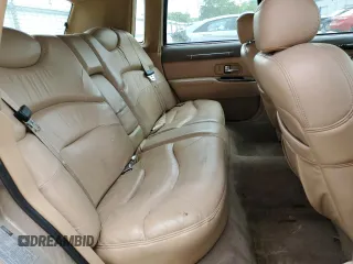 1997 Lincoln Town Car Signature z VIN 1LNLM82W8VY705599, wystawiony jako Copart lot #53096165 z przebiegiem 166 585 mil mil oraz Tytuł czysty. Historia ofert i sprzedaży dostępna na DreamBid. Obrazek 10.