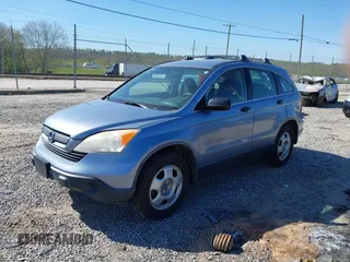 2007 Honda CR-V LX with VIN JHLRE38357C055256, listed as a IAAI auction lot 42050441 with 311,062 mi miles. Bid and sale history available at carsss.com. Image 2.