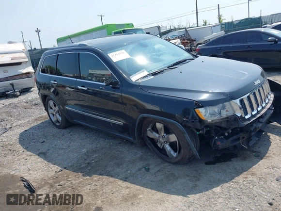 2011 Jeep Grand Cherokee Overland with VIN 1J4RR6GT3BC574037, listed as a IAAI auction lot 42411532 with 158,765 mi miles and . Bid and sale history available at DreamBid. Image 1.