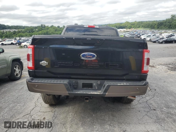 2023 Ford F-150 XL with VIN 1FTEW1C83PFA84267, listed as a Copart auction lot 65042545 with 54,508 mi miles and Salvage title. Bid and sale history available at DreamBid. Image 6.