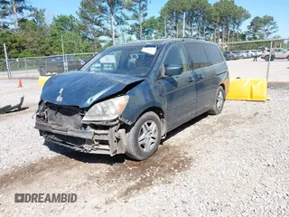 2006 Honda Odyssey EX-L with VIN 5FNRL38666B460590, listed as a IAAI auction lot 41998373 with 266,486 mi miles and . Bid and sale history available at carsss.com. Image 2.