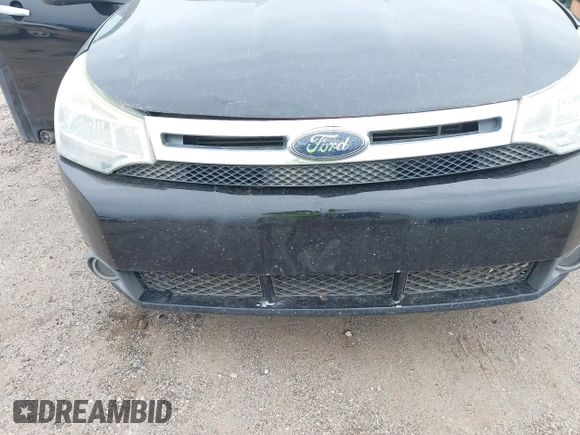 2008 Ford Focus SE z VIN 1FAHP35N88W201941, wystawiony jako IAAI lot #42209632 z przebiegiem 115 901 mil mil oraz . Historia ofert i sprzedaży dostępna na DreamBid. Obrazek 6.
