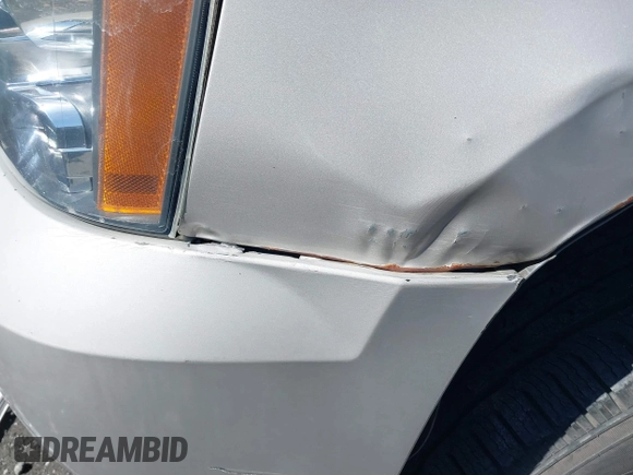 2007 Chevrolet Tahoe LTZ with VIN 1GNFC13JX7R149914, listed as a IAAI auction lot 41497405 with 264,932 mi miles and . Bid and sale history available at DreamBid. Image 13.