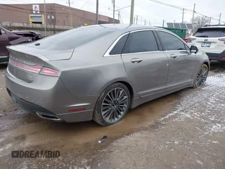 2015 Lincoln MKZ Hybrid with VIN 3LN6L2LUXFR625229, listed as a IAAI auction lot 41723225 with 107,171 mi miles. Bid and sale history available at carsss.com. Image 4.
