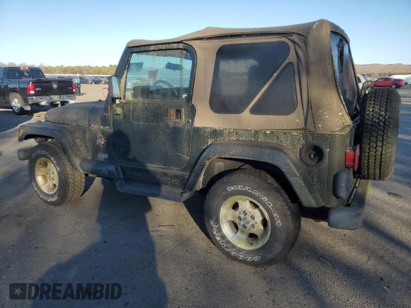 2002 Jeep Wrangler Sahara with VIN 1J4FA59S12P757177, listed as a Copart auction lot 42808925 with 71,049 mi miles and Clean title. Bid and sale history available at DreamBid. Image 2.