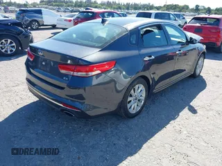 2018 Kia Optima EX with VIN 5XXGU4L36JG223501, listed as a IAAI auction lot 41722310 with 63,481 mi miles and . Bid and sale history available at carsss.com. Image 4.