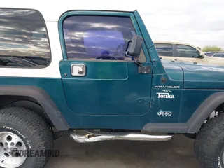 1998 Jeep Wrangler Sport with VIN 1J4FY19S7WP787679, listed as a IAAI auction lot 41764883 with 134,144 mi miles. Bid and sale history available at carsss.com. Image 13.