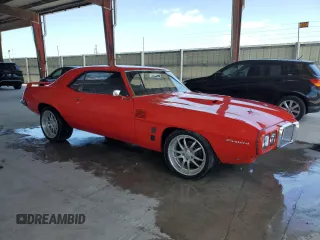 1969 Pontiac Firebird z VIN 223379ULL6573, wystawiony jako Copart lot #57812295 z przebiegiem 142 mil mil oraz Tytuł czysty. Historia ofert i sprzedaży dostępna na DreamBid. Obrazek 4.
