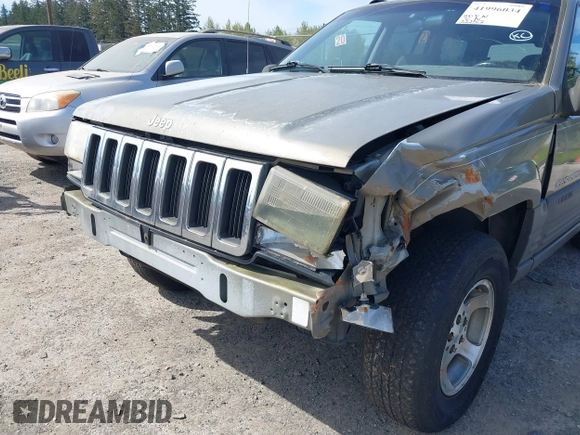 1997 Jeep Grand Cherokee Laredo with VIN 1J4GZ58S5VC500257, listed as a IAAI auction lot 41996034 with 222,513 mi miles and . Bid and sale history available at DreamBid. Image 6.