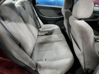 2003 Kia Spectra with VIN KNAFB121735217341, listed as a Copart auction lot 72016504 with 116,224 mi miles and Salvage Title. Bid and sale history available at DreamBid. Image 10.