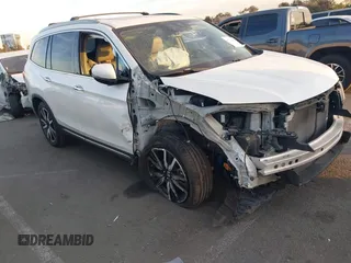2019 Honda Pilot Touring 8-Passenger with VIN 5FNYF5H97KB005203, listed as a IAAI auction lot 41399930 with 47,267 mi miles. Bid and sale history available at carsss.com. Image 1.