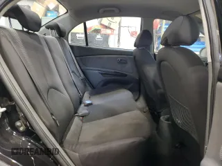 2010 Kia Rio with VIN KNADH4B37A6641845, listed as a Copart auction lot 51861215 with 163,894 mi miles and Salvage Title. Bid and sale history available at DreamBid. Image 10.