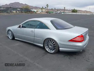 2003 Mercedes-Benz CL 5.0L with VIN WDBPJ75J23A036694, listed as a IAAI auction lot 41745660 with 131,571 mi miles. Bid and sale history available at carsss.com. Image 3.