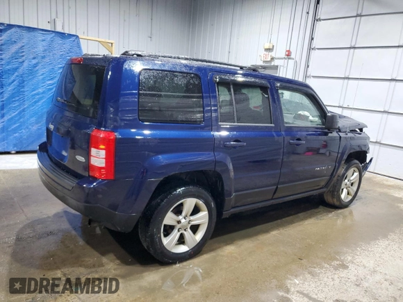 2014 Jeep Patriot Latitude with VIN 1C4NJRFB0ED852882, listed as a Copart auction lot 49674915 with 130,367 mi miles and Salvage title. Bid and sale history available at DreamBid. Image 3.