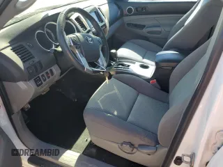 2014 Toyota Tacoma PreRunner with VIN 3TMJU4GN7EM159880, listed as a Copart auction lot 43932065 with 125,564 mi miles and Salvage Title. Bid and sale history available at carsss.com. Image 7.