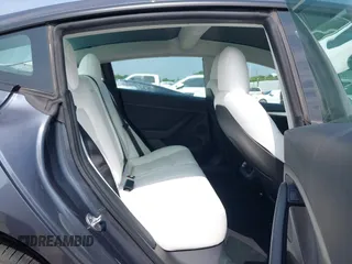 2023 Tesla Model 3 z VIN 5YJ3E1EAXPF414646, wystawiony jako IAAI lot #39514743 z przebiegiem 10 529 mil mil oraz . Historia ofert i sprzedaży dostępna na DreamBid. Obrazek 8.