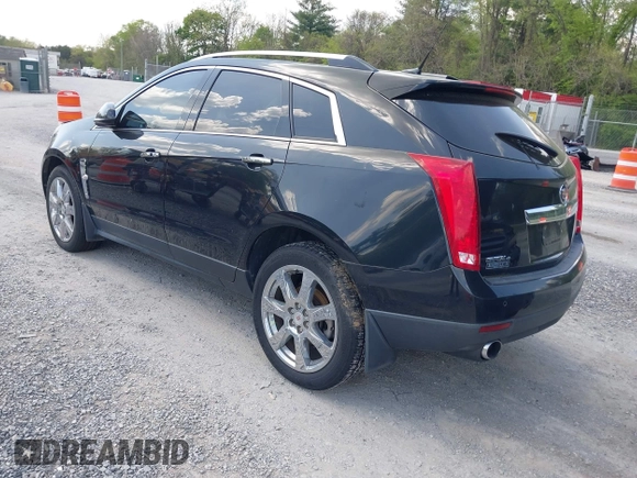2012 Cadillac SRX Performance Collection with VIN 3GYFNEE32CS512118, listed as a IAAI auction lot 42158452 with 143,449 mi miles. Bid and sale history available at carsss.com. Image 3.